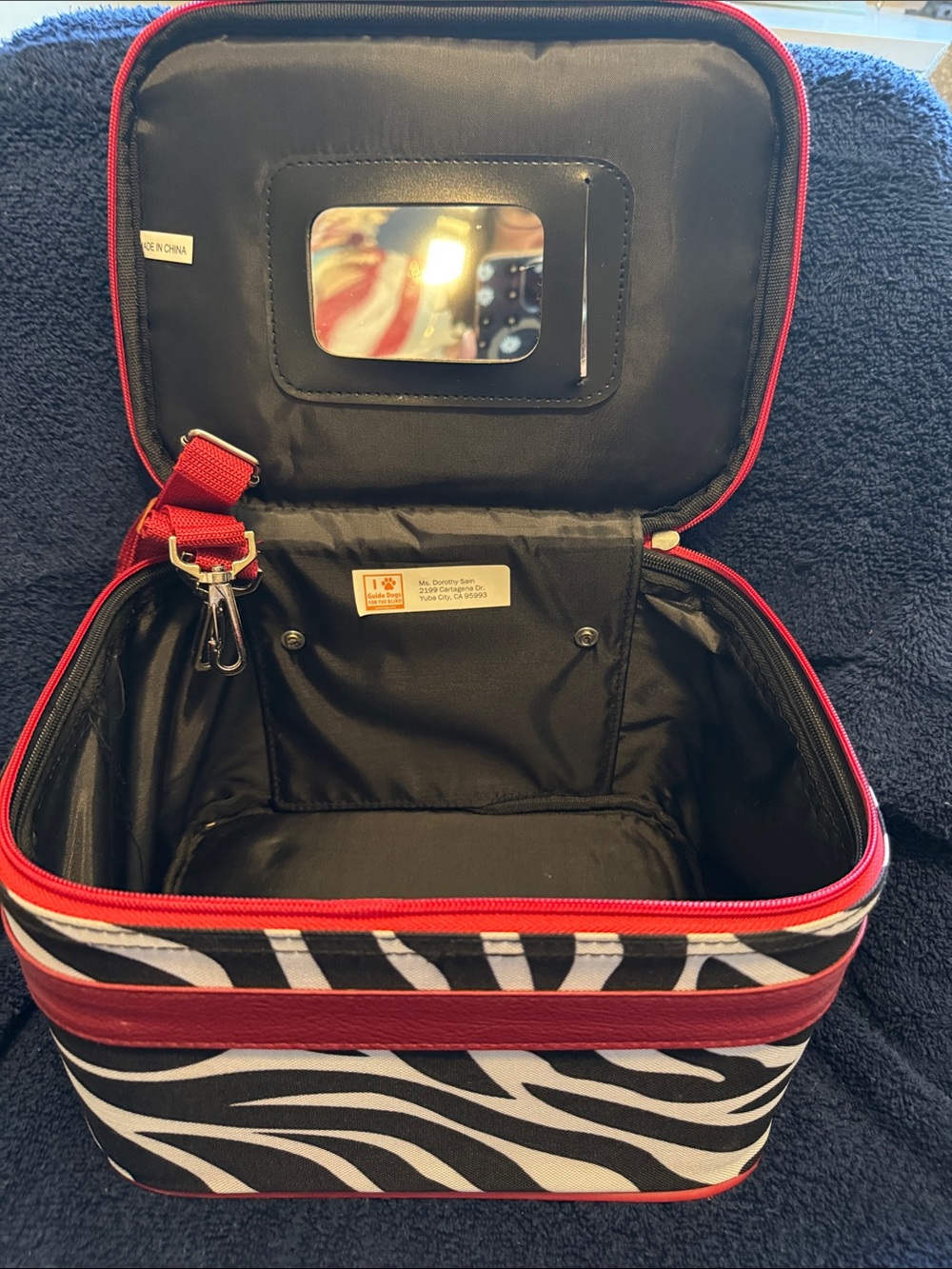 Zebra Print Travel Cosmetic Case with Red Trim
